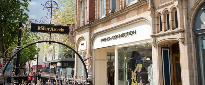 Shopfronts and the Miller Arcade entrance on the remodelled Fishergate in Preston