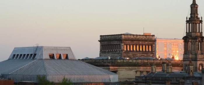 The Preston city centre skyline at dusk with the civic buildings lit