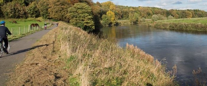 The Ribble corridor east of Preston, water and rough ground under an open sky