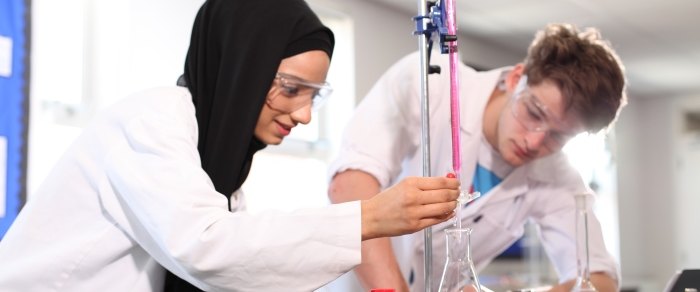 Students working in a college science laboratory