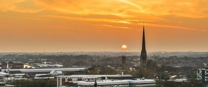 The Preston skyline at sunset with the Harris tower against the sky